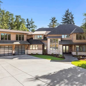 Three car garage house with large driveway