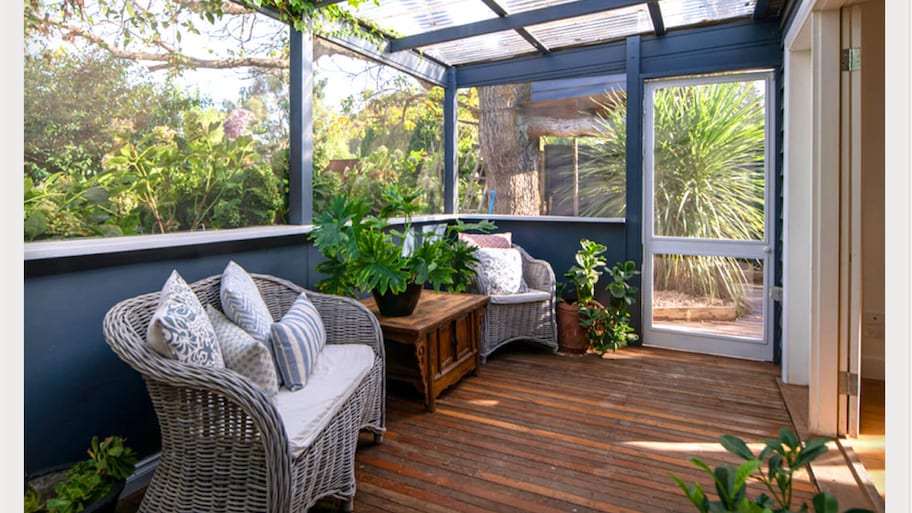 wicker furniture in sunroom