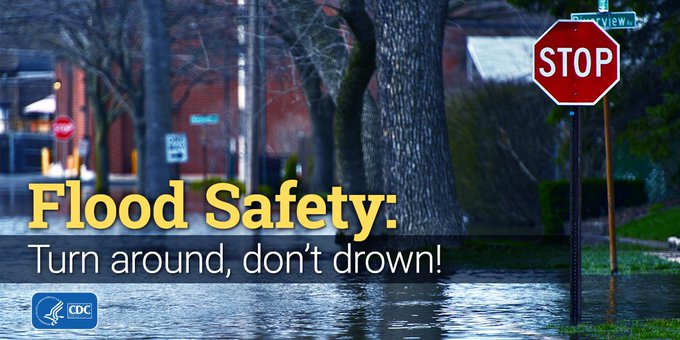 A flooded road. The text reads “Flood Safety: Turn around, don’t drown!” 