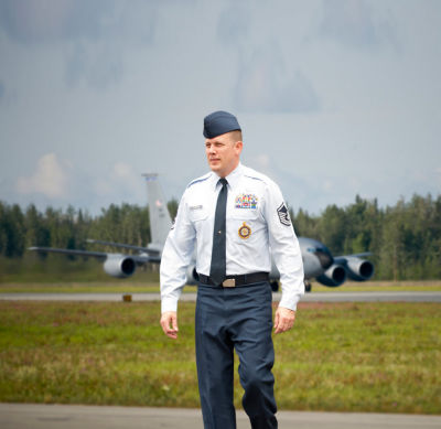 Image of air force reserve in front of plane