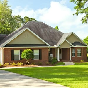 The exterior of an exposed brick wall house