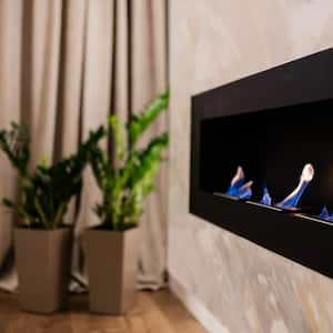A gas fireplace in a living room