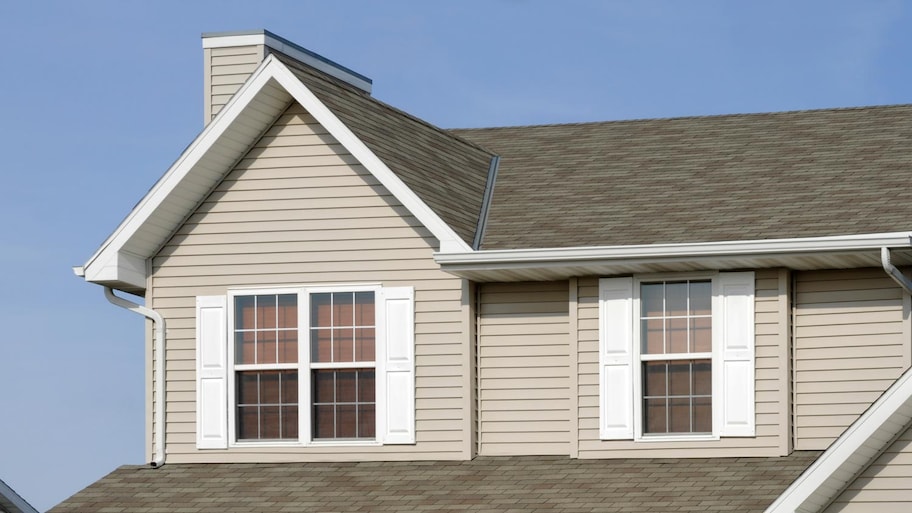 A house with beige vinyl siding