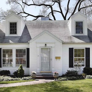 The exterior of a white suburban house