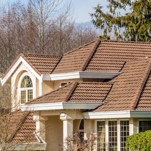 A roof of a house with nice windows 