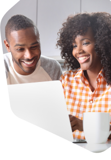 Couple browsing the internet on their laptop