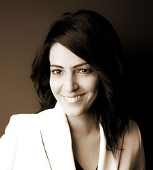 Kavita Oberoi publicity photo - close-up in sepia.jpg