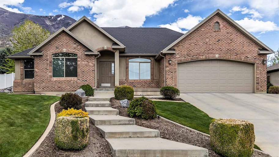 brick house with cement steps 