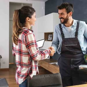 woman greeting handyman