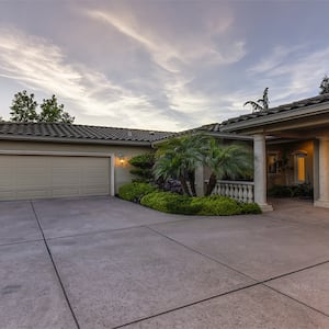 Front of house and garage with concrete driveway