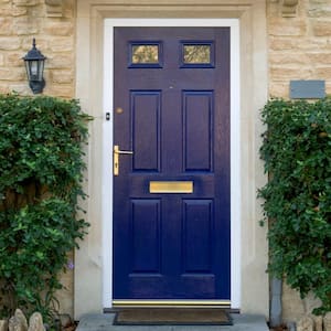 A house’s blue front entrance door