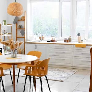 A spacious bright kitchen with large windows