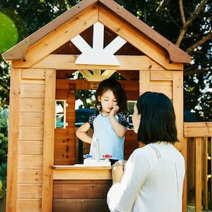 Mother and child in playhouse