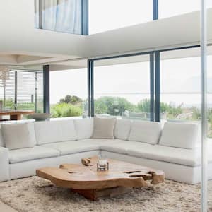 Open concept living room with tall windows