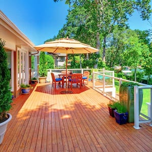 House wood deck with table and chairs