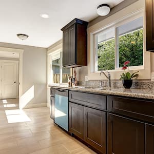 Modern kitchen interior with stained cabinets