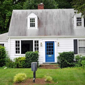 The exterior of a house surrounded by trees