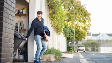 A man taking out the trash