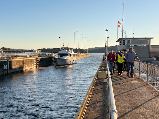 Recreation Vessel “Betsye” out of Fort Lauderdale, Florida, navigates downstream Sept. 29, 2022, on the Tennessee River into Fort Loudoun Lock in Lenoir City, Tennessee, as members of the Fort Loudoun Yacht Club begin a tour to learn about navigation. (USACE Photo by Lee Roberts)