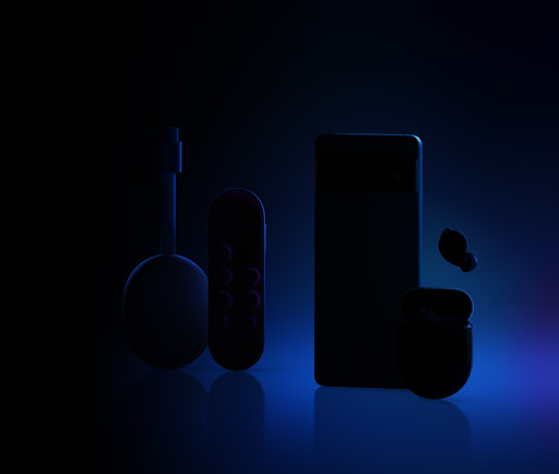 Chromecast with Google TV next to a Pixel phone and Pixel earbuds, all grayed out in the dark