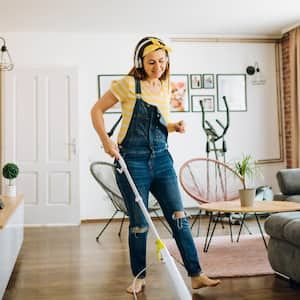 A woman cleaning her house