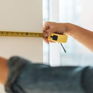 Using a tape measure for a home improvement project