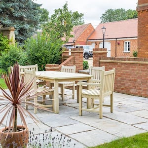 house and backyard with patio furniture 