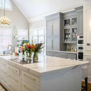 An open-space living room and kitchen with vaulted ceiling