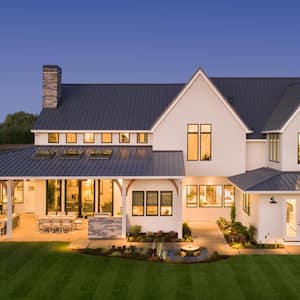 Beautiful exterior home lit up at dusk