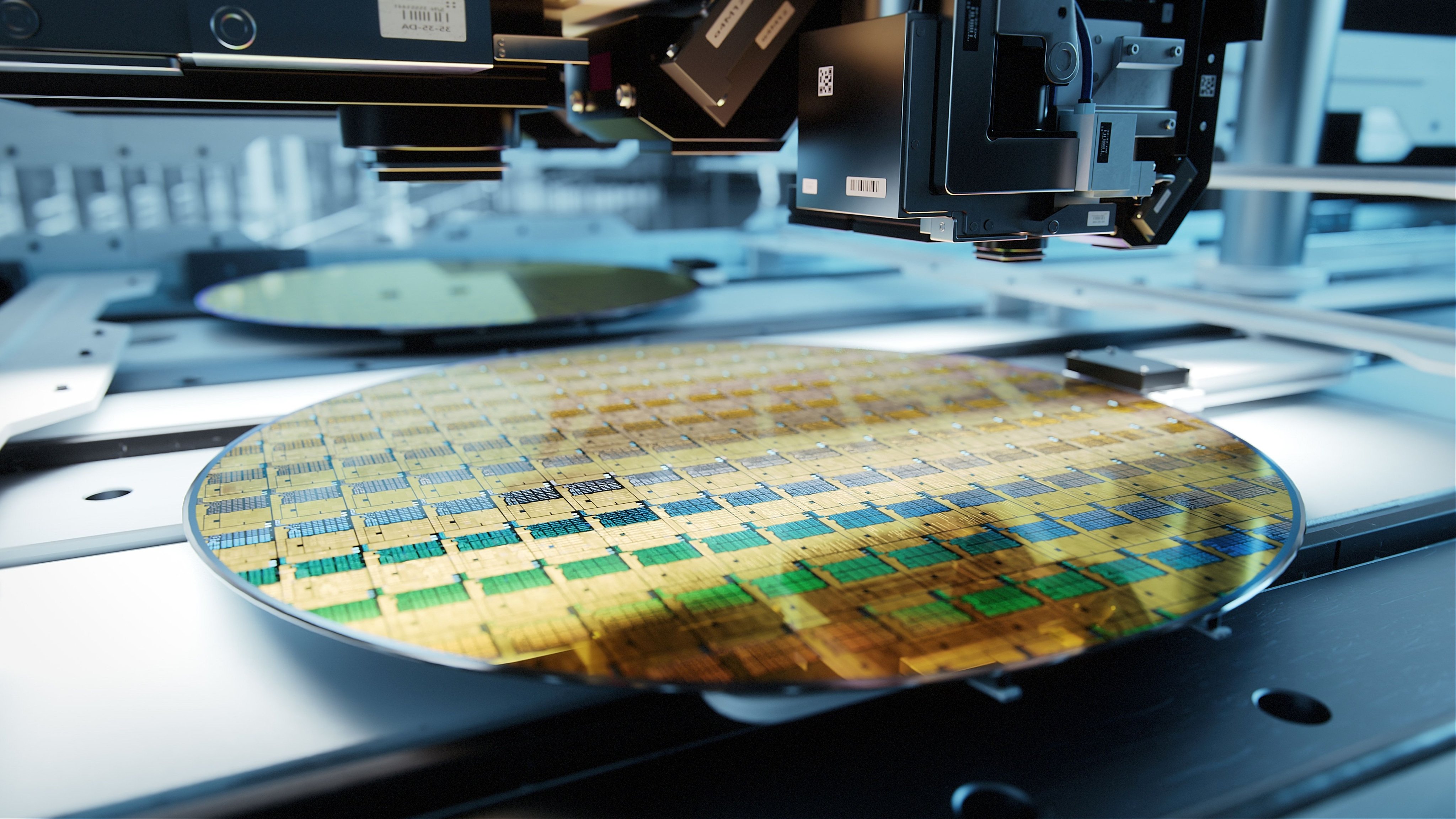 Flat, circular wafer containing semiconductor components on its surface.