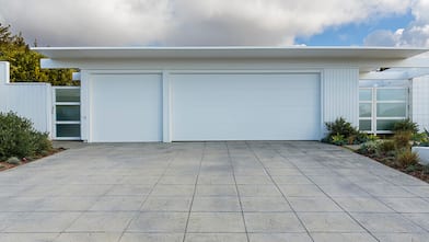 Concrete driveway for three car garage