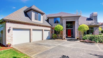 Home with a concrete driveway