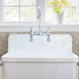  white kitchen sink and beige counter  