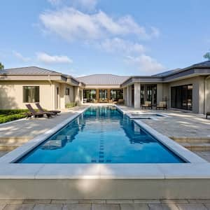 An estate house with a lap pool