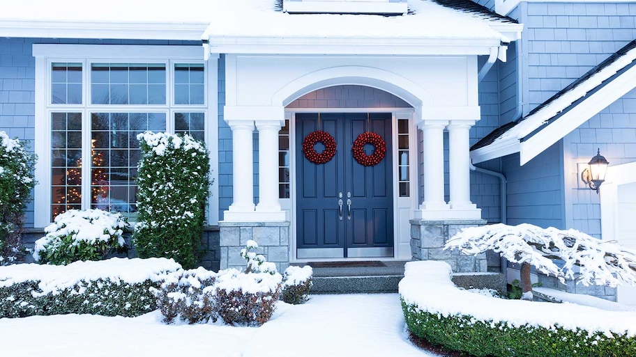 Home exterior during winter holiday season