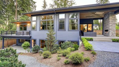 New two-story home with flat roof