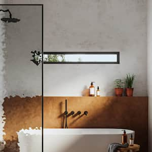 A modern bathroom having both a shower and a bathtub