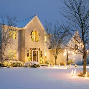Christmas decorated home with holiday lighting