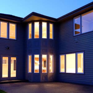 A view of a well lit house at night