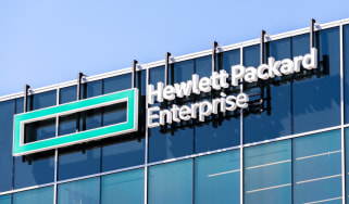 Hewlett Packard Enterprise (HPE) logo on a glass building