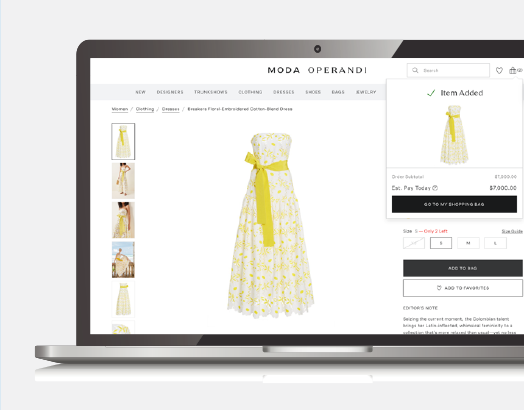 moda operandi dress product page on a laptop computer