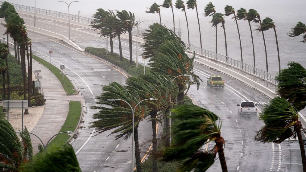 PHOTO: Motorists travel across the John Ringling Causeway as Hurricane Ian churns to the south in Sarasota, Fla., Sept. 28, 2022.