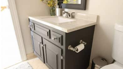 Dark green bathroom vanity