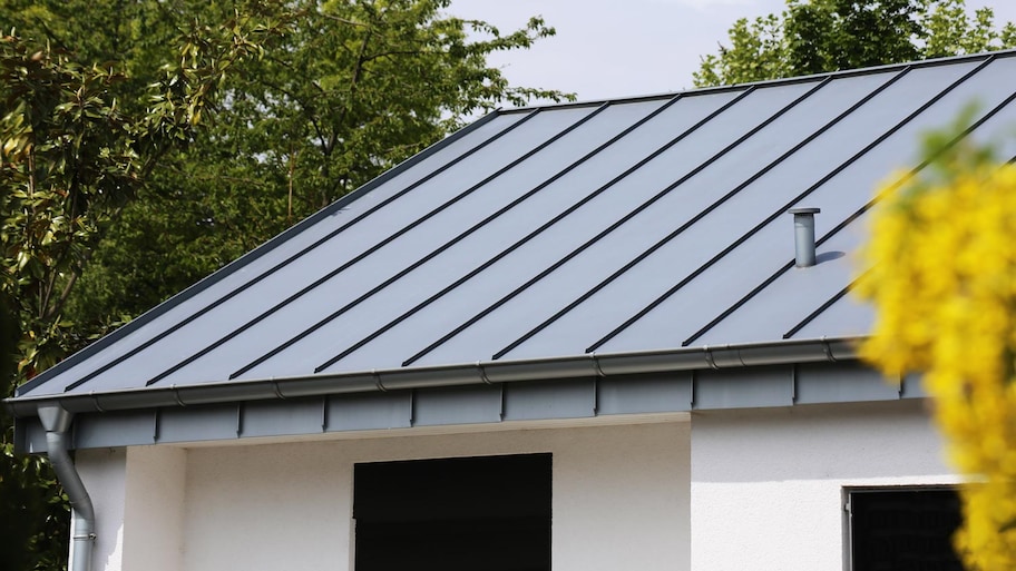 A house with a standing seam metal roof 