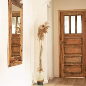 A boho entrance with a retro mirror