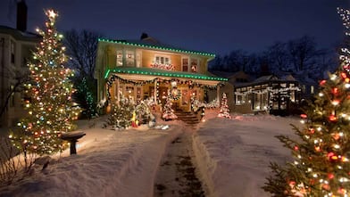 A view of christmas lights and decorations on a house