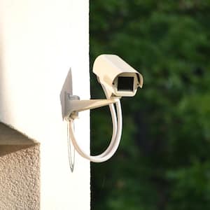 A security camera on the exterior of a house