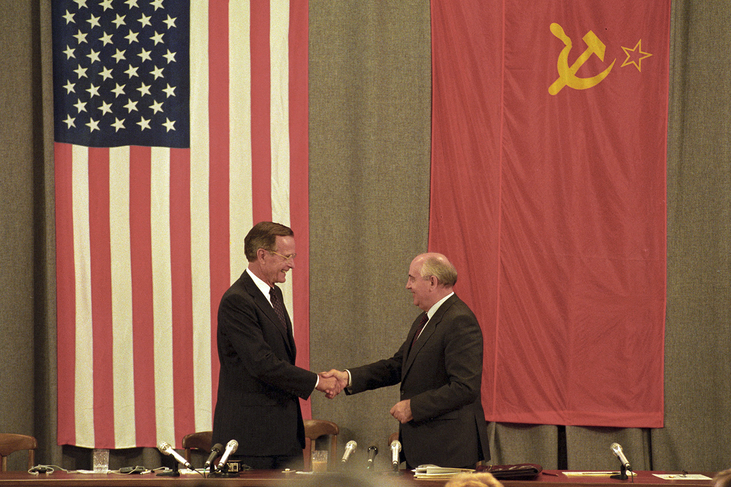 U.S. President George H. W. Bush and Soviet leader Mikhail Gorbachev shake hands after holding a press conference in Moscow on July 31, 1991.
