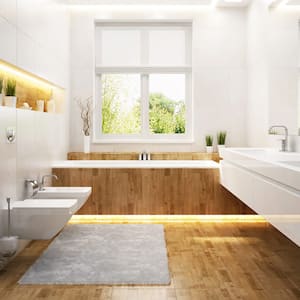 The interior of a bright modern bathroom