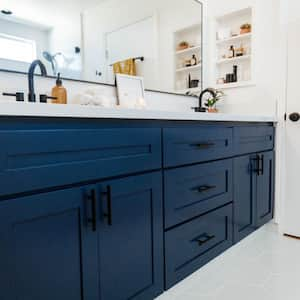 navy blue vanity in white bathroom